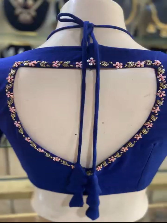 a beauty of golden handwork work with colourful thread and sequence all over blouse