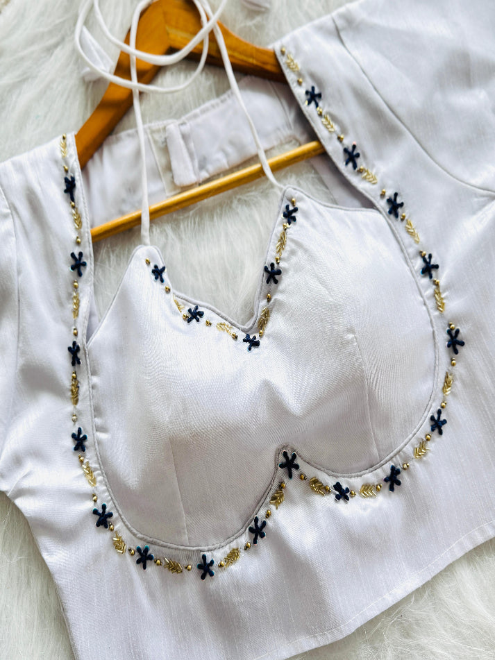 a beauty of golden handwork work with colourful thread and sequence all over blouse