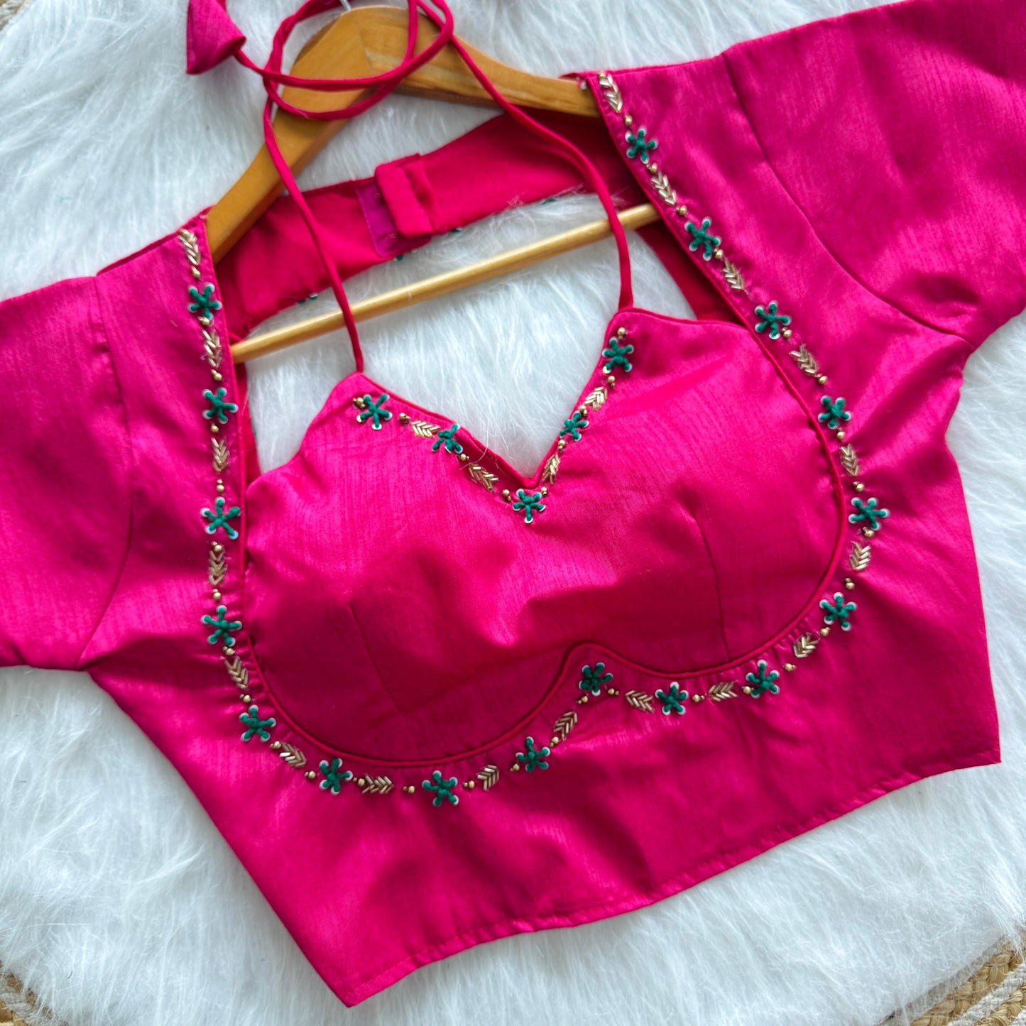 a beauty of golden handwork work with colourful thread and sequence all over blouse