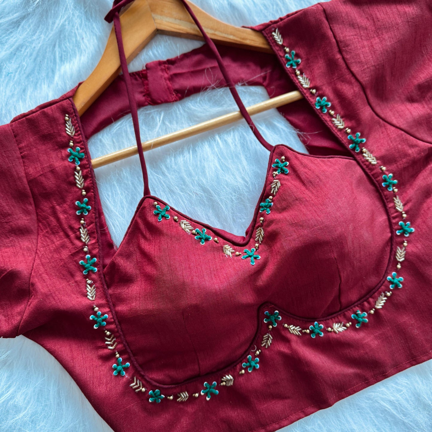 a beauty of golden handwork work with colourful thread and sequence all over blouse