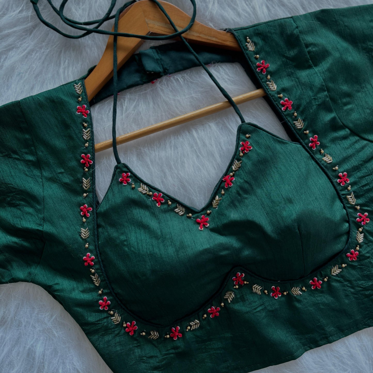 a beauty of golden handwork work with colourful thread and sequence all over blouse