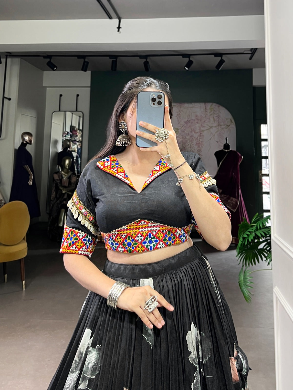black color women's tussar silk with print and foil print lehenga choli set