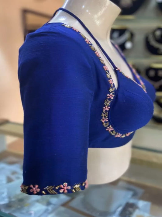A beauty of golden handwork work with colourful thread and sequence all over blouse