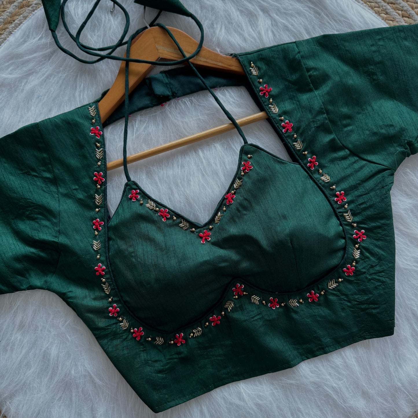a beauty of golden handwork work with colourful thread and sequence all over blouse