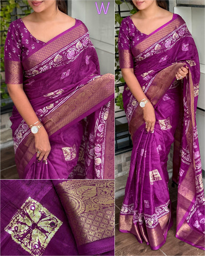 Purple saree with intricate patterns worn by a person, 