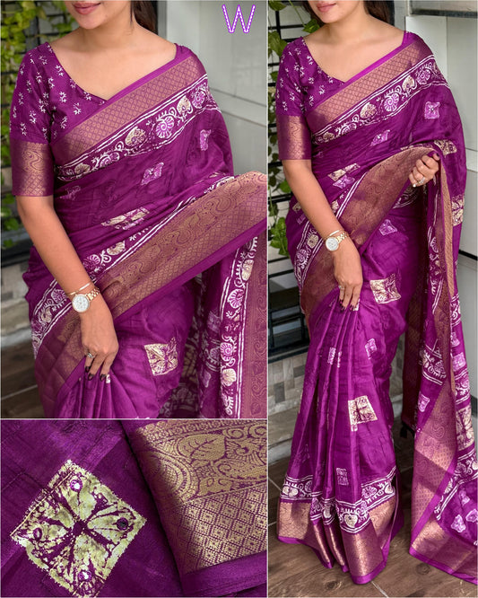Purple saree with intricate patterns worn by a person, 