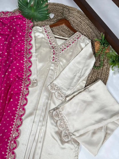 This cream Moonga silk suit with fine embroidery exudes effortless elegance, while the fuchsia pink dupatta💗 - RPD Fashion