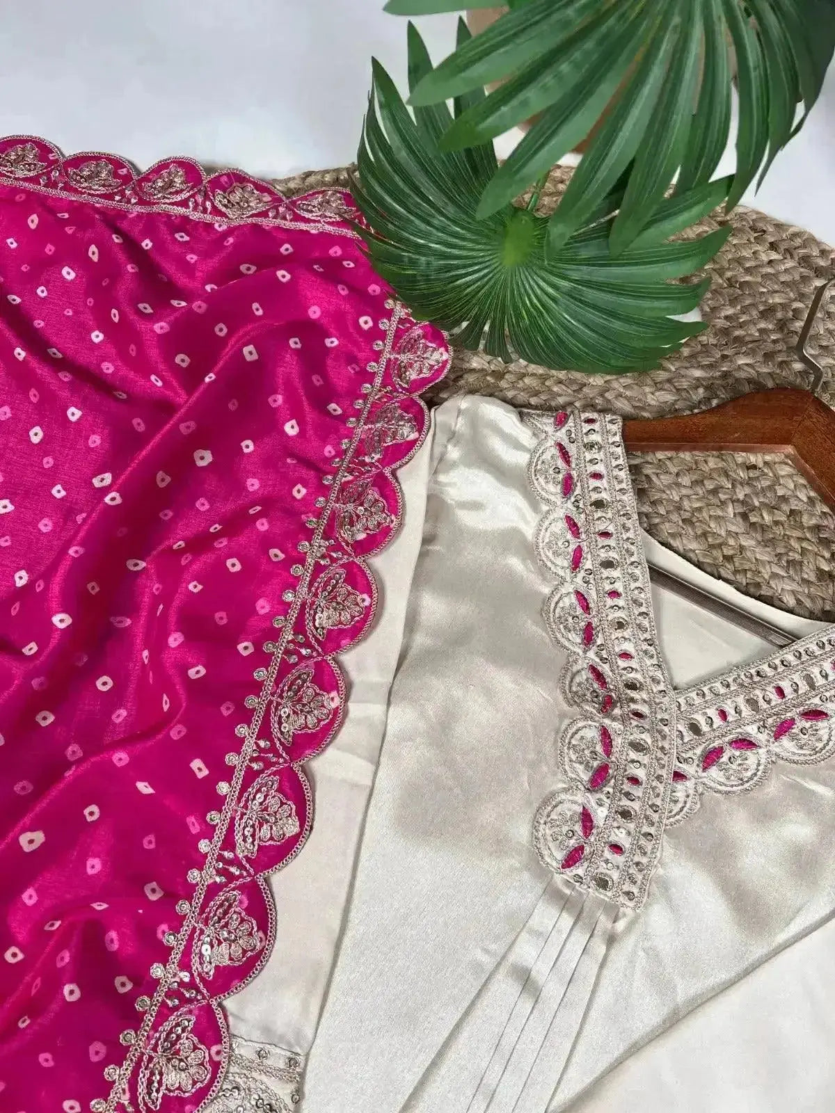 This cream Moonga silk suit with fine embroidery exudes effortless elegance, while the fuchsia pink dupatta💗 - RPD Fashion