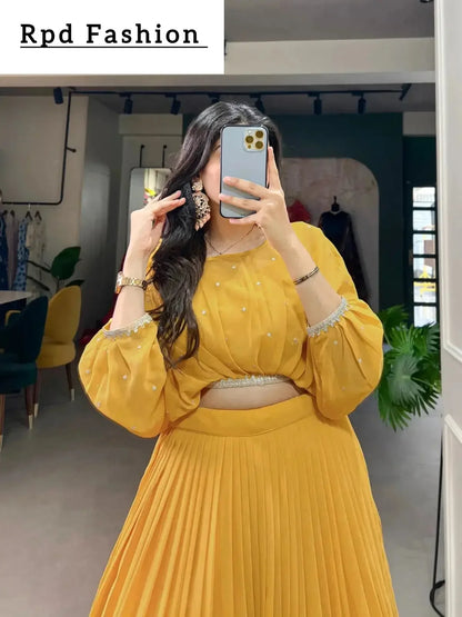 This stitched lehenga set includes Georgette fabric with sequin-thread embroidery and a matching top with beautiful lace-bordered sequin butties. - RPD Fashion